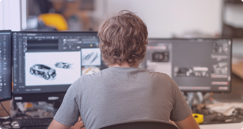 Designer working on car models